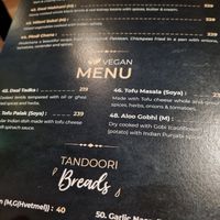 Vegan section on the menu with confusing items such as ghee and milk products at Leela Indian Restaurant  in Bergen