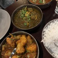 From left to right 1) Aloo Gobi 2 & 3) the tofu dishes   at Leela Indian Restaurant  in Bergen