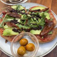 Avo and sundried tomatoes plus rocket tostada  at Essència Brunch & Lunch in Menorca