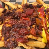 Quinoa chili fries. I added ketchup and mustard.  at The Burger Spot in Plymouth