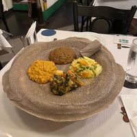 Injera pancake with vegan stews plate at Queen Sheeba in Tokyo