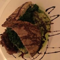 Chicken filet on mashed fava beans  at Peacefood Cafe - Downtown in New York City