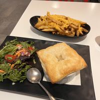 Pot pie and cheesy fries   at Peacefood Cafe - Downtown in New York City