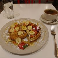 Chicken and waffles with peppermint tea at Peacefood Cafe - Downtown in New York City