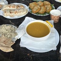 guava juice, flat bread, lentil soup, falafel, fries in a wrap (potato roll), tahinii  at Old Cairo in Cairo