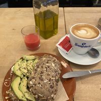 Pan con aguacate y Tomate y un Café con leche de avena   at La Clandestina Librería-Café in Cadiz