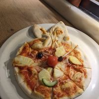 Rabbit pizza with vegan cheese at Vapiano - Foorum in Tallinn