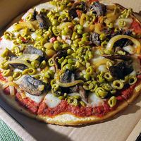 Custom pizza, a special. He also had a wonderful roasted cauliflower wrap as a special. Very easy to order online. at iCreate Cafe in Pottstown