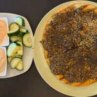 Za'atar Mana'eesh with baba ghanouj, hummus, and cucumbers at iCreate Cafe in Pottstown