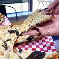 That cheese pull 😍🤤  at Curry Pizza House in Frisco