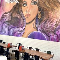 Super cute mural inside   at Curry Pizza House in Frisco