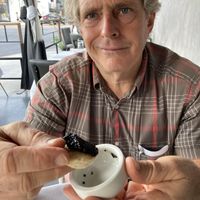 Kelp caviar, sour cream and blini  at Crossroads Kitchen in Los Angeles