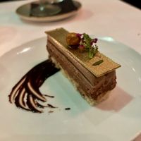 Chocolate & Hazelnut Petit Gateau, w/ hazelnut biscuit, hazelnut crunch, cremeux Nutella and mousse. at Crossroads Kitchen in Los Angeles