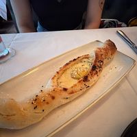 Khachapuri (bread, cheese and tomato yolk)  at Crossroads Kitchen in Los Angeles