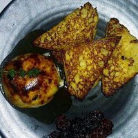 Cheese bread and dried fruit. Dont remember the name of this but menu changes w/the seasons at Crossroads Kitchen in Los Angeles