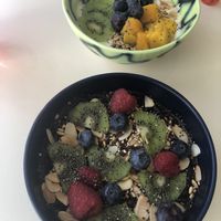 Vegan bowls with fruit  at Oatis in London
