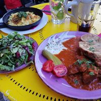 Sojagulasch mit Serviettenknödel und Käsespätzle at Cafe Harvest in Vienna