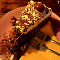 Chocolate cake with cherriess  at Cafe Harvest in Vienna