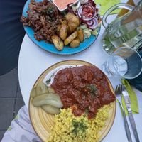 Gyros plate and soy goulash with pasta dumpling at Cafe Harvest in Vienna