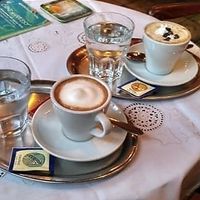 An irish coffee + a capuccino at Cafe Harvest in Vienna