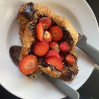 Vegan croissant with vegan chocolate spread and strawberries   at The New Leaf Co-op in Edinburgh