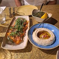 Halloumi starter, sides of humus, tabbouleh. at Leyla Lebanese Cuisine in St Julians
