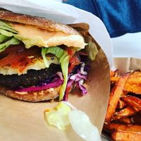 Hemp burger with pineapple and sweet potato fries at Soi Soi in Helsinki
