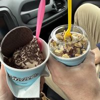 brownie soft serve oreo sandwich, peanut butter soft serve with mixed nuts and dark chocolate saucee  at Nikki's Custard in Lancaster