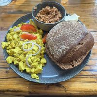 Rührtofu mit Tahini, Roggenbrötchen und hausgemachter Tomatenaufstrich  at WandelBar-Café in Flensburg