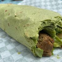 Chimichurri Seitan Wrap in spinach tortilla  at Conscious Cravings - South Austin in Austin