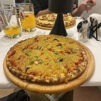 Vegetarian pizza with cheese swapped for vegan cheese  at Taverna Mezedofolia in Crete