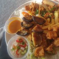 Mishroom Satay: Mushroom skewers served with peanut sauce and fresh cucumber pickle dip at Chilli Banana in Wilmslow