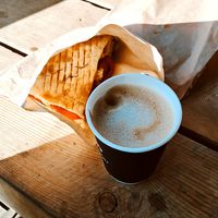 Oat cappuccino and vegan sandwich at Coffee Kor in Mestia