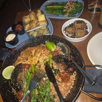 Tender stem broccoli, patata fritas, mushroom croquetas, vegan paella. at La Farola in North London