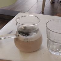 Wild zaatar tea with oat milk at Maisa Space in Amman