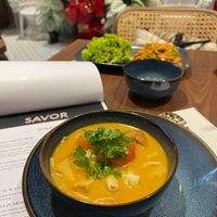 TOMMY YUMMY (TOM YUM) RM20
A medley of coco squid, cauliflower, oyster mushrooms, seaweed tofu, young coconut, fresh coriander, and creamy coconut milk
 at SAVOR in Kuala Lumpur