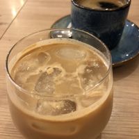 Iced americano with oat milk and americano   at Café Hin & Veg in Leipzig
