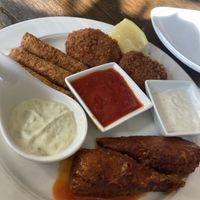 Appetizer trio: mozzarella sticks, crab cakes, Buffalo wings  at 3 Brothers Pizza Cafe in Farmingdale