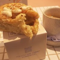 Carrot cake cinnamon bun and coffee at Cinnamood  in Luxembourg City
