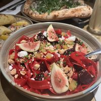Beetroot Pasta with Figs, Nut Crunch and vegan Feta    at Vegitalian in Amsterdam