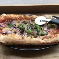 Sunny puttanesca pizzetta  at Vegitalian in Amsterdam