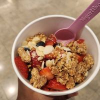 Mango sherbert flavor with toppings (strawberries, blueberries, granola, shaved almonds) at Yogurtland in Las Vegas