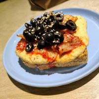 Hummus con kimchi at Café Área in Santiago