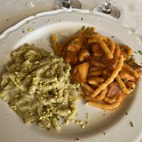 Assaggio di due primi: busiate alla Norma e busiate al pesto di pistacchi   at Agriturismo Le Arcate in Marsala