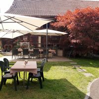 Garden seating at Landgasthof Grossteil in Giswil