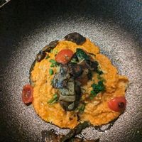 Filled pasta with a red almond pesto at Primo Pasta Amsterdam in Amsterdam