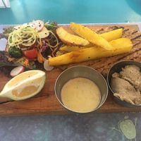 Milanesa de quinoa with baba ghanoush and salad and chips at Chirimoya in Salta