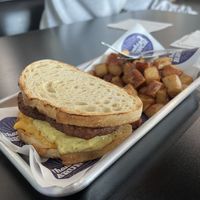 Addicted to the vegan breakfast sandwhich on sourdough with just egg and impossible sausage patties.   at ThanksABrunch in Gilbert