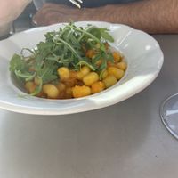 Vegan sweet potato gnocchi with arugula   at Café Landtmann in Vienna