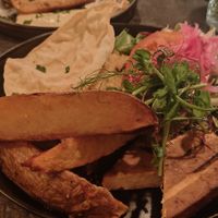 Grilled tofu with roasted potatoes and hummus. at Goose in Malmo